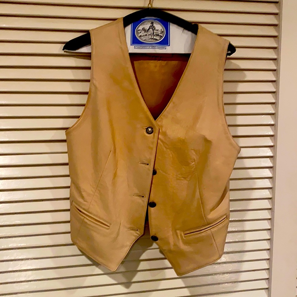 Absolutely wonderful leather vest . In EUC CONDITION. Vests are  the rave